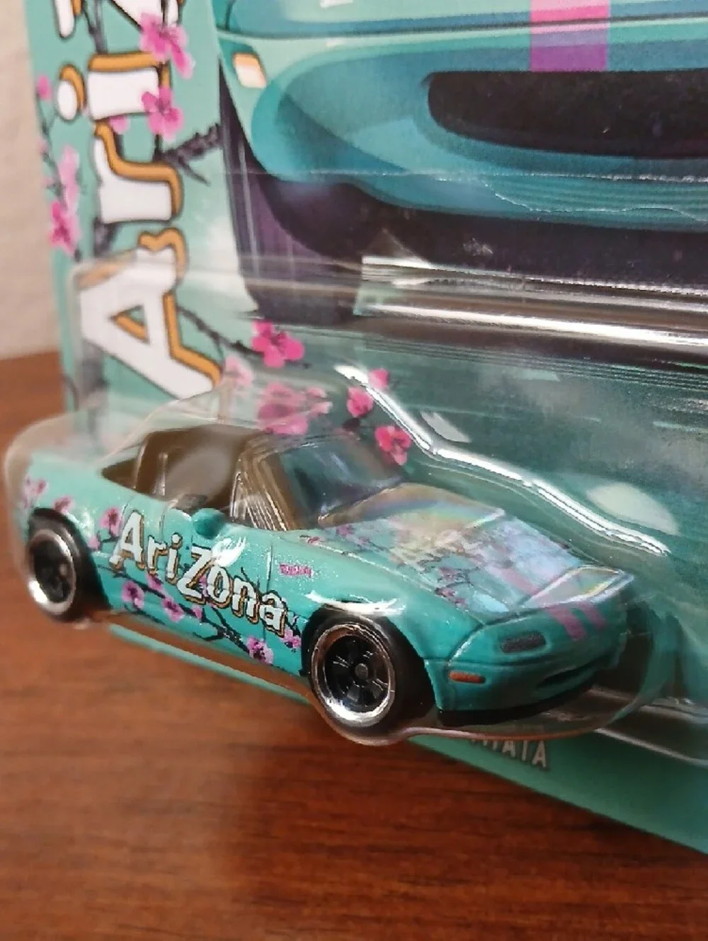 Hot Wheels 1991 Mazda MX-5 Miata - Arizona Teal Pink Silver Series - Picture 2 of 4